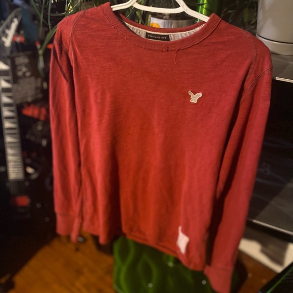 American Eagle red distressed long sleeve